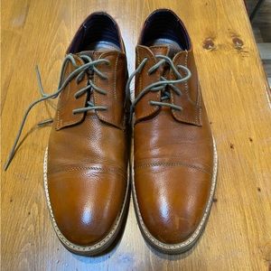 Ben Sherman cap toe leather dress shoes.